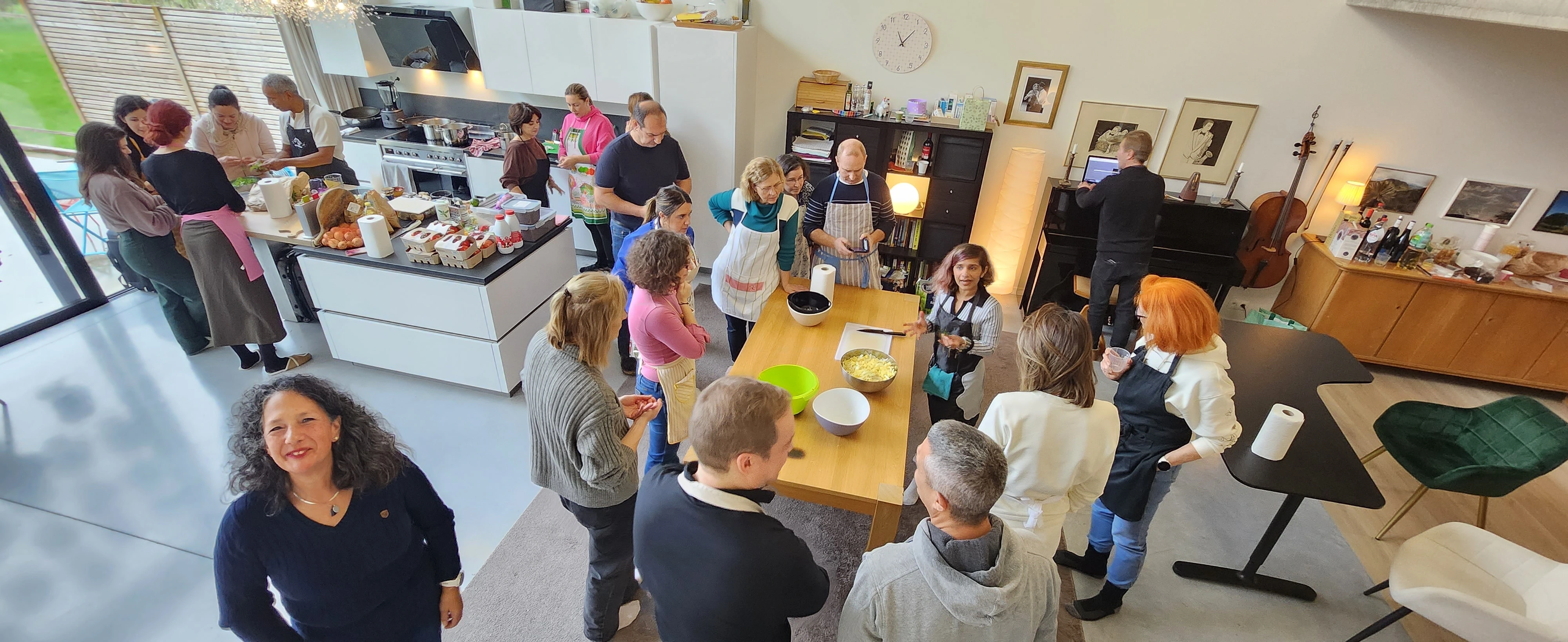 Larger workshop group working together at the table.